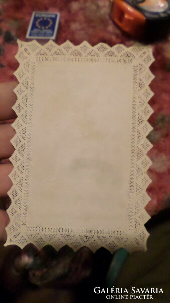 12 X 8 cm holy image with lace edges. There may be minimal creasing at the corners, but it is not incomplete.