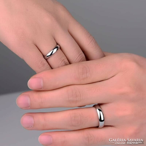 Shiny medical metal hoop ring, it does not blacken like silver. It is as beautiful as white gold