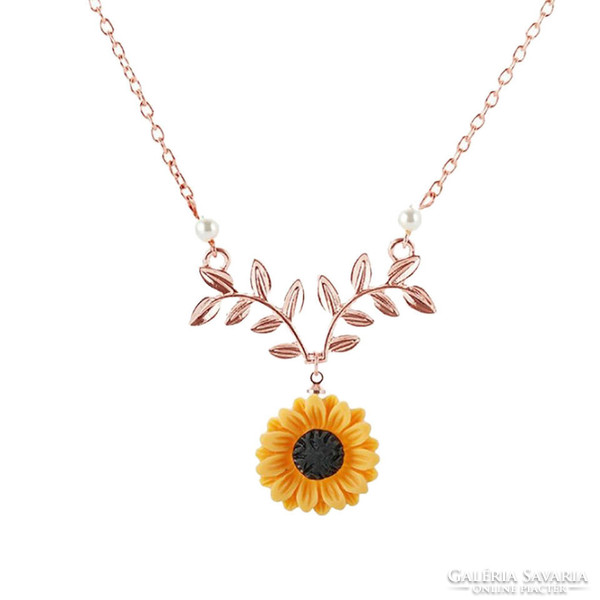 Nym42 - sunflower flower pendant on a rosegold colored necklace