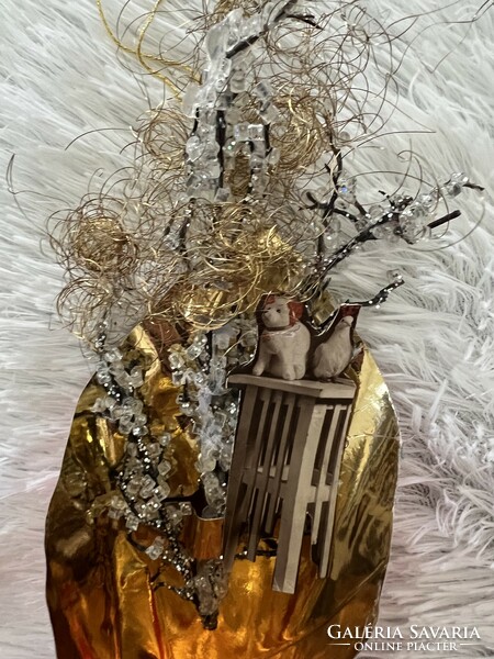 Christmas tree decoration with an angelic sugar holder made of old and new papers