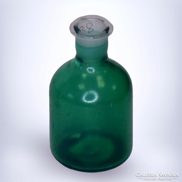 Green pharmacy bottle