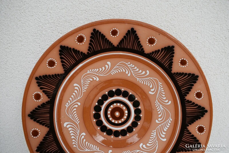 A beautiful large wall plate gift with a small bowl