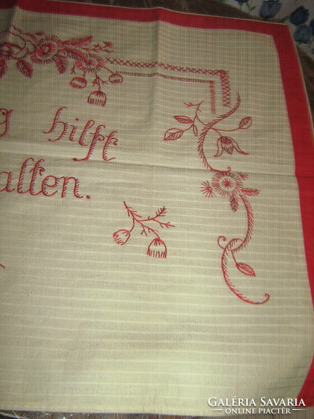 Beautiful hand-embroidered wall hanging with red floral German lettering