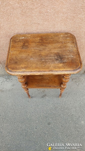 Antique small wooden table with beautiful shapes