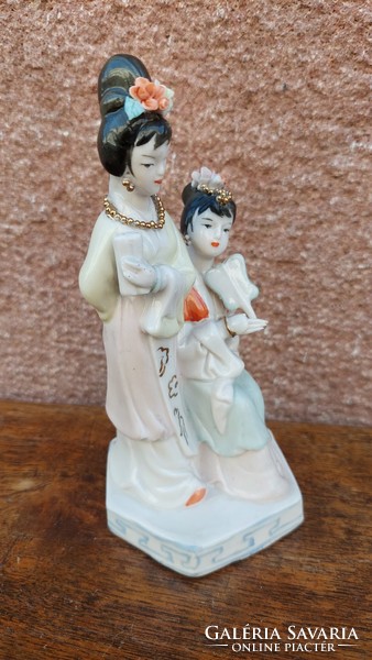 Oriental porcelain statue