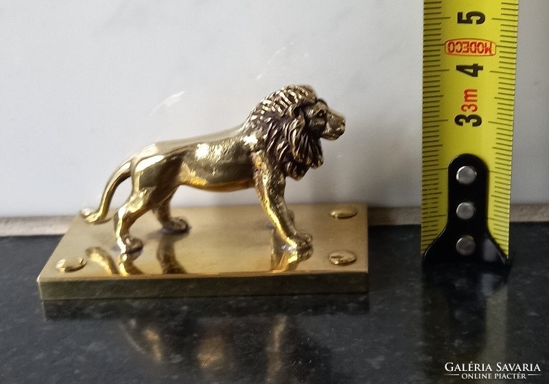 Copper, brass lion ornament