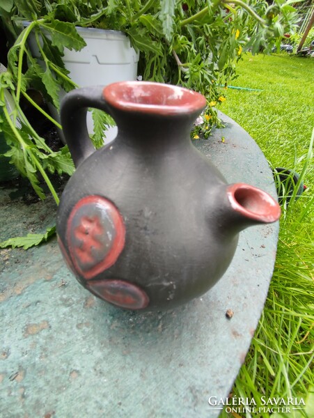 Charming folk ceramic jug