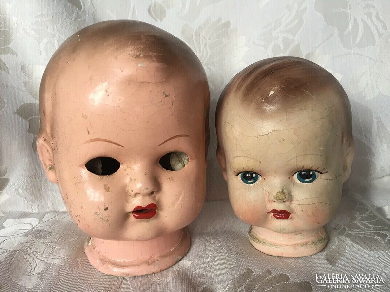 Old, antique papier-mâché doll heads, doll heads and a canvas body in one