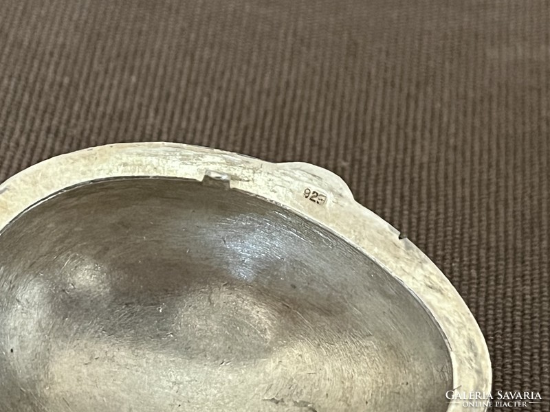 Egg-shaped silver plate