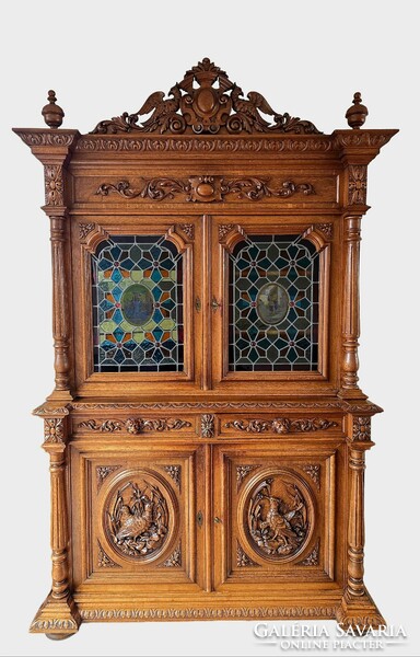 A823 antique, richly carved renaissance style sideboard with a hunting scene