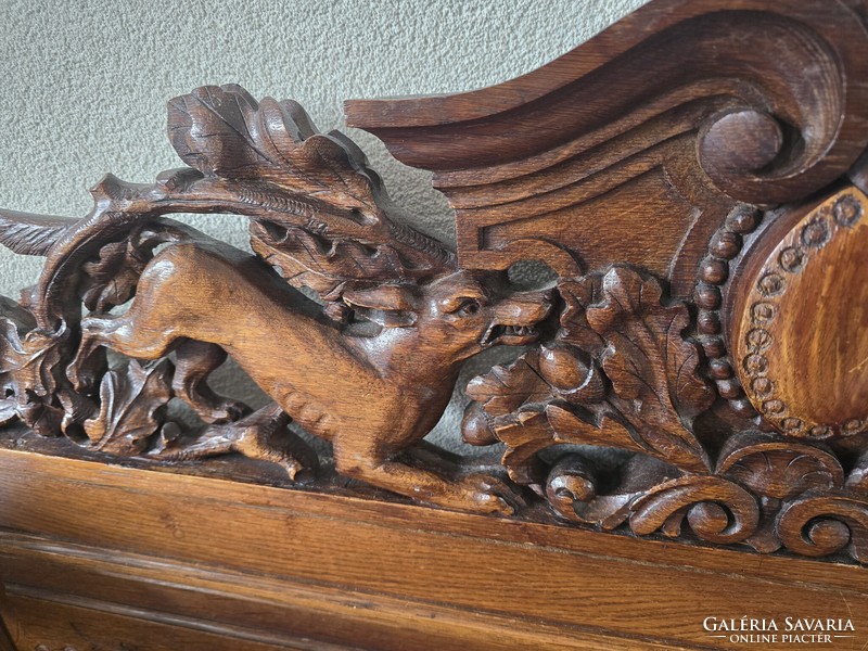 A822 antique, richly carved hunting scene renaissance style bench