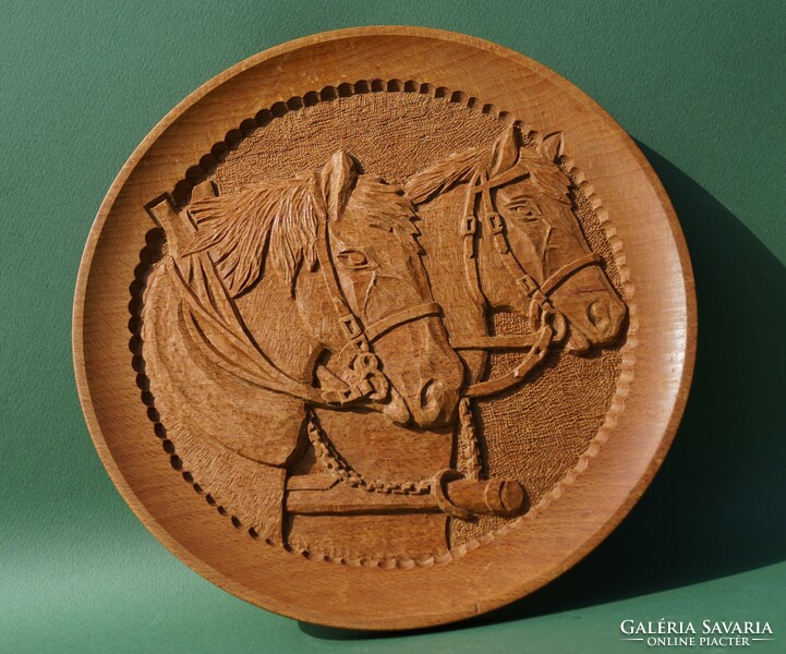 Representation of a horse carved into an oak disc horses horse portrait wood carving carved wall picture