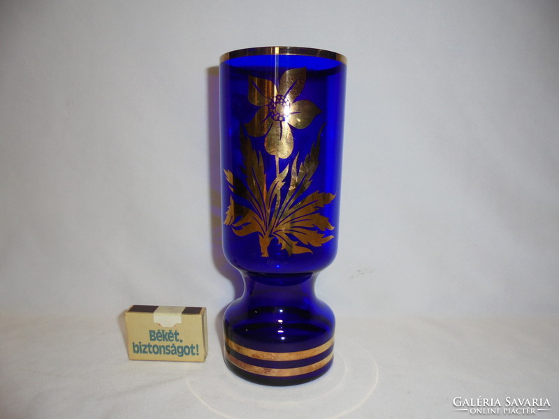 Old, blue, gilded flower pattern glass vase