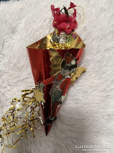 An angelic sugar holder Christmas tree decoration made using materials from old and new papers