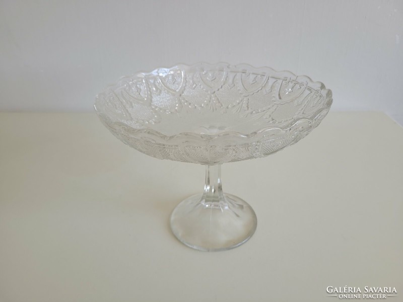 Old glass bowl with a base, crystal glass fruit bowl with garland