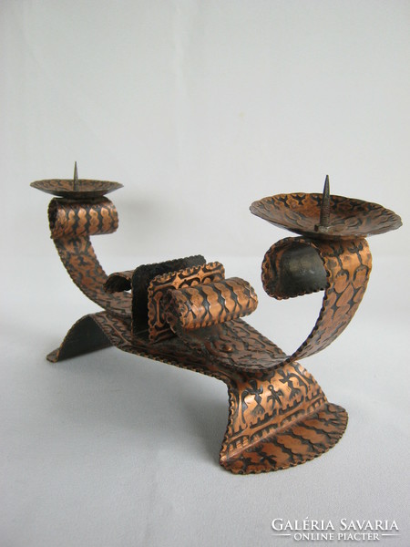 Copper two-pronged candle holder with match holder in the middle