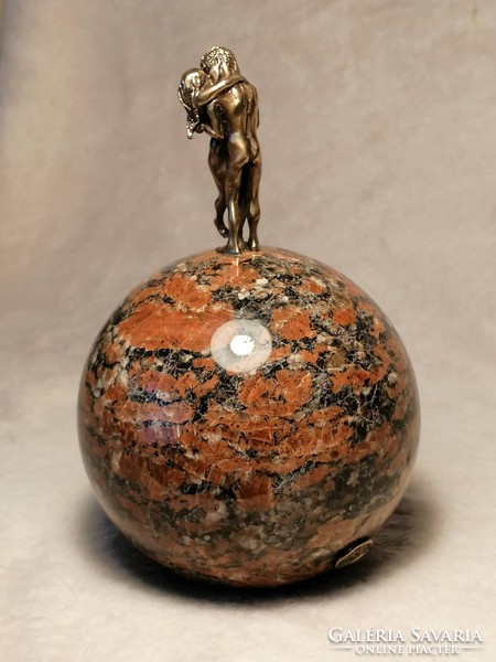 Lovers bronze statue miniature on red granite sphere