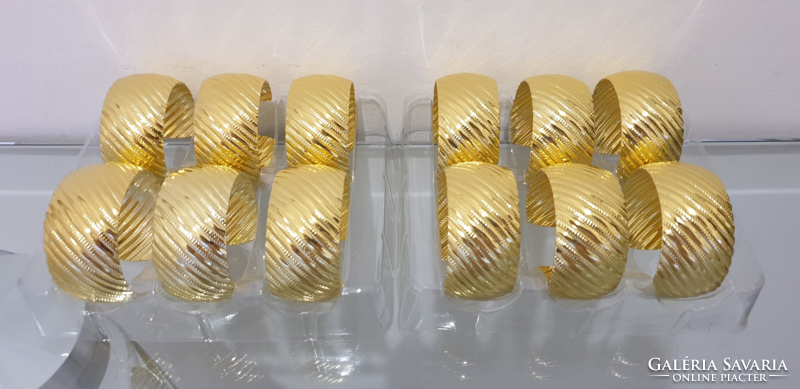 12 gold colored metal napkin rings