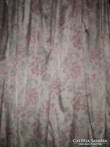 Huge curtain with flowers in a beautiful color scheme