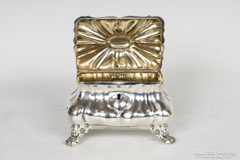 Silver sugar box with a lion figure on top