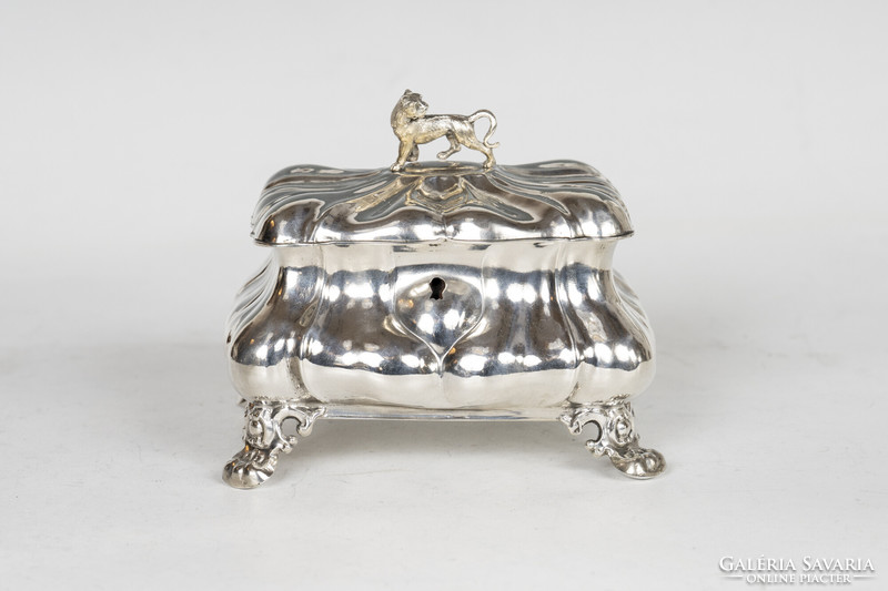 Silver sugar box with a lion figure on top
