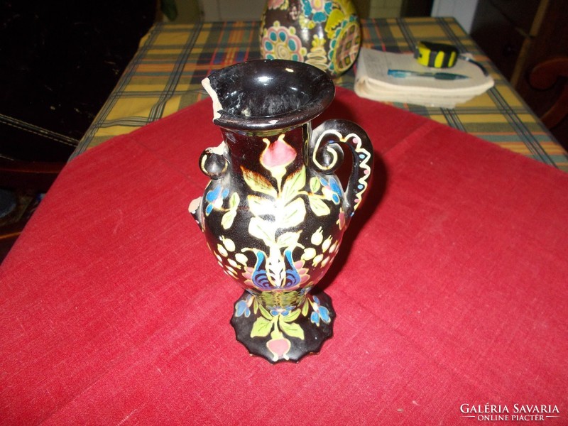 Vase with a rich pattern. Head of Sandor marked