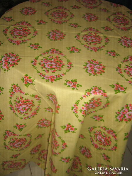 Beautiful yellow floral summer tablecloth with a cheerful atmosphere, new