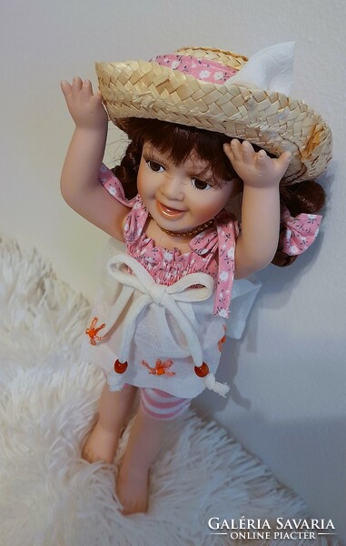 Porcelain doll with full porcelain body 27 cm