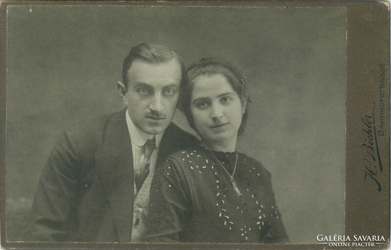 Early 1900s. H. Bichler photography studio, Steyr. Studio photo of a young couple.