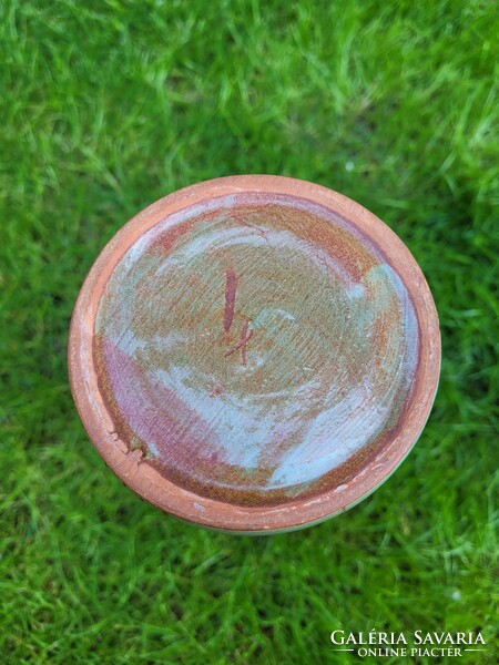 A ceramic vase by a great industrial artist, scratched and fired with images of houses.