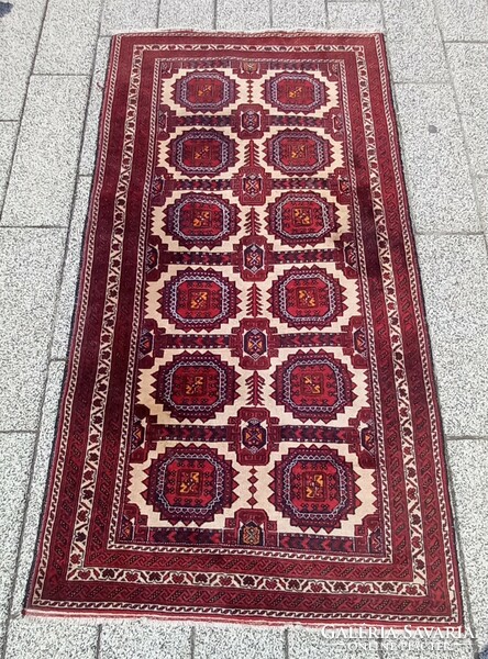 Antique afghan hand-knotted carpet with elephant feet is negotiable