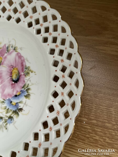 A beautiful Romanian decorative plate with an openwork edge.