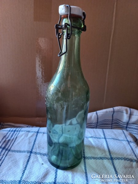 Old bottle with crystal water