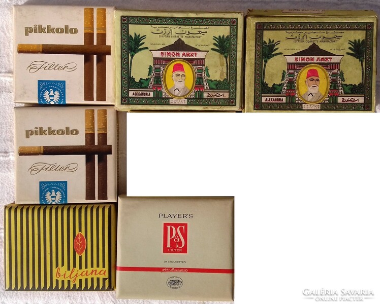 Old foreign empty cigarette boxes in pieces