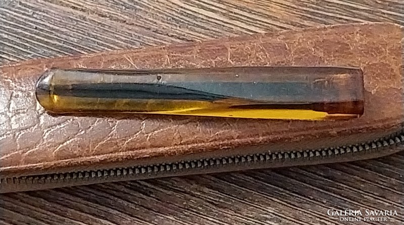 Vintage amber cigarette holder with leather case
