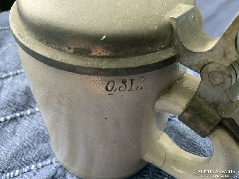 German ceramic jug with tin lid