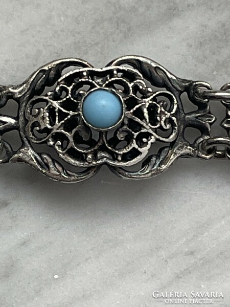 Beautiful old silver bracelet with turquoise stones.