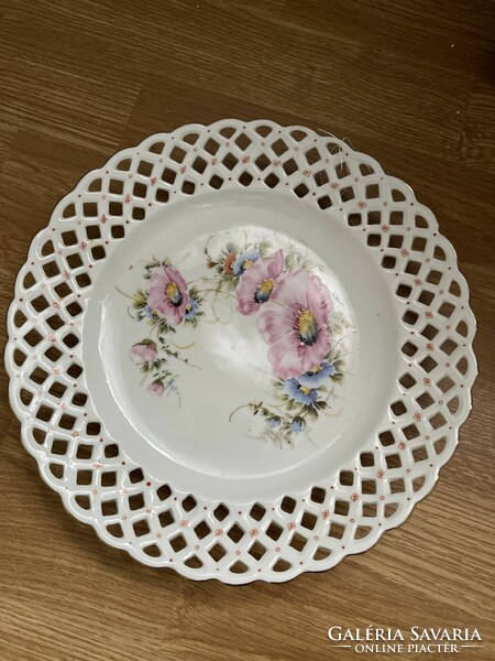 A beautiful Romanian decorative plate with an openwork edge.