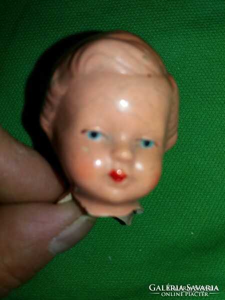 Antique hand-painted pre-last century porcelain doll head according to the pictures