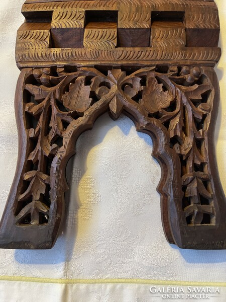 Beautifully carved folding book holder.