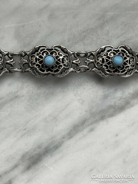 Beautiful old silver bracelet with turquoise stones.