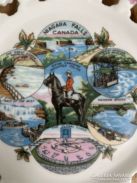 Beautiful openwork gilded decorative plate, landmarks of Canada.