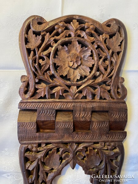 Beautifully carved folding book holder.