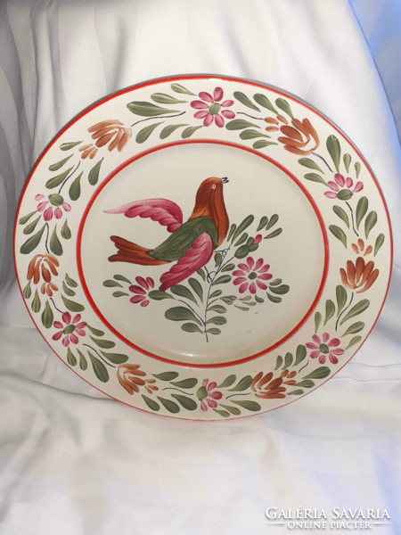 Bird wall plate with a folk motif