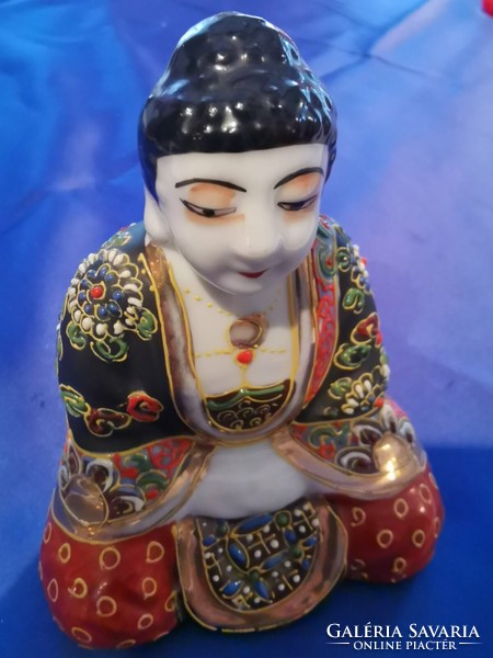 Porcelain buddha statue