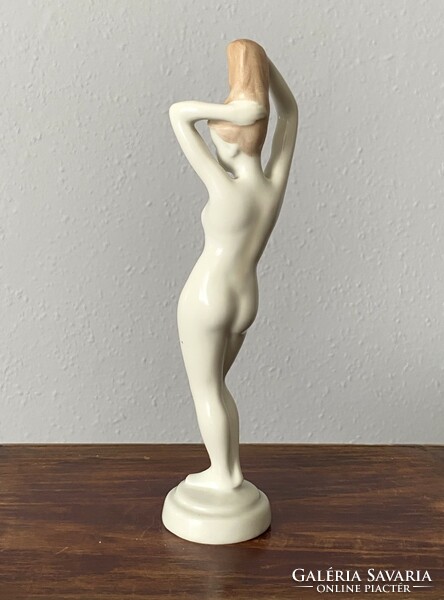 Aquincumi stretching female nude painted porcelain statue 23 cm