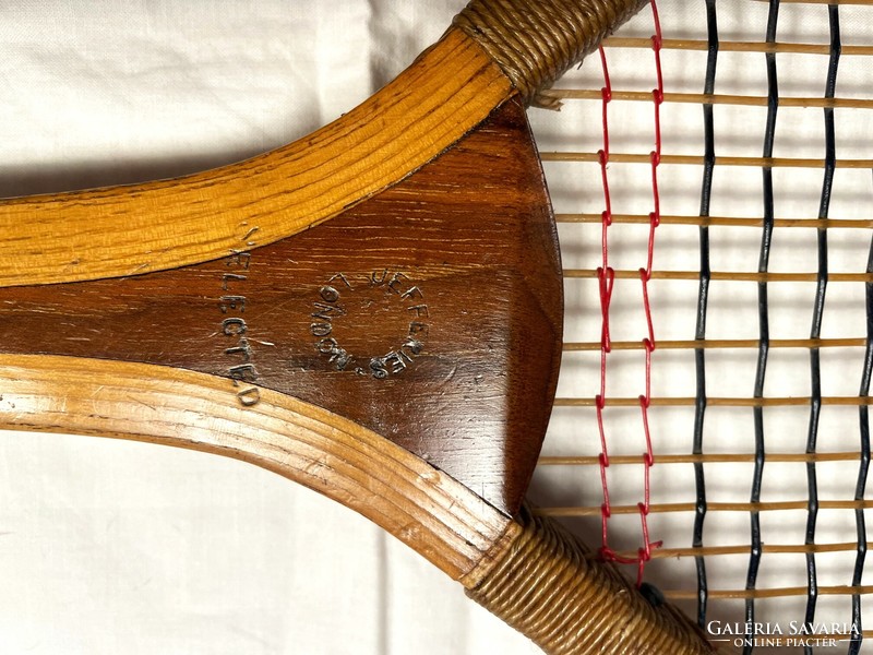 Antique jefferies london tennis racket with contemporary canvas case marked old sports equipment from the beginning of the last century