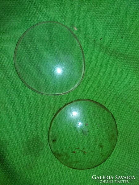 A pair of antique round glasses with glass lenses from the Sandberg optics workshop in Szeged, according to the pictures
