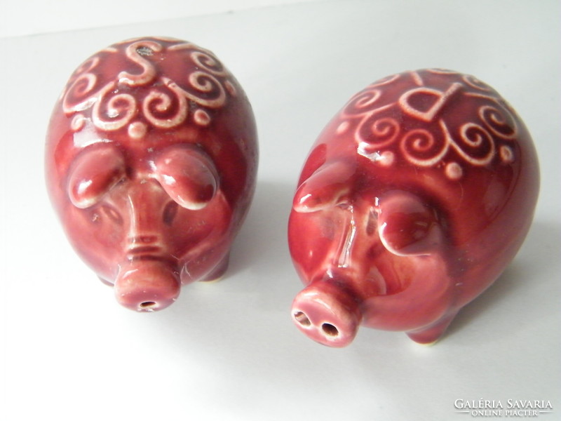 Retro glazed ceramic salt and pepper shaker in the shape of a pig