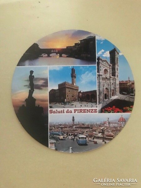 Traveling memory, souvenir. Foreign postcard. Circular. Colorful. Written.Saluti da firenze